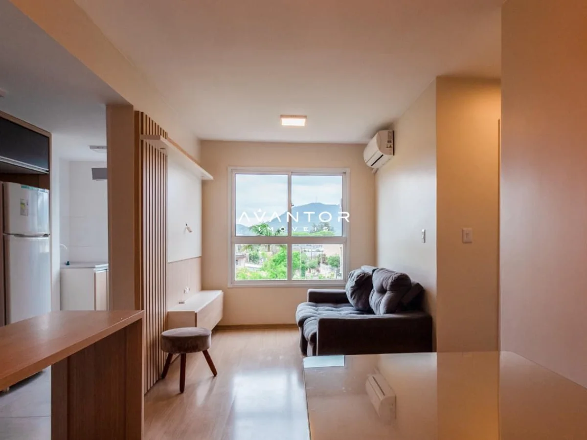 Sala de estar integrada à cozinha com janela — Apartamento com 2 quartos à venda em Noal, Santa Maria/RS