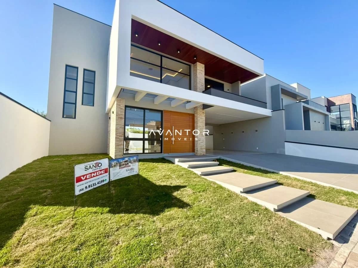 Fachada da casa com jardim frontal — Casa com 3 quartos à venda no Cidade Universitária, em Camobi, Santa Maria/RS
