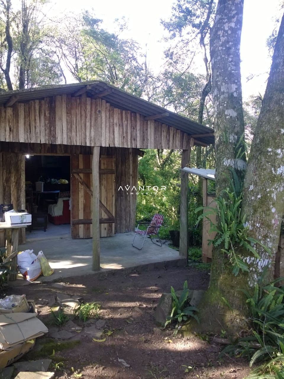 Fachada da casa com varanda — Terreno à venda em Parque Serrano I, Itaara/RS