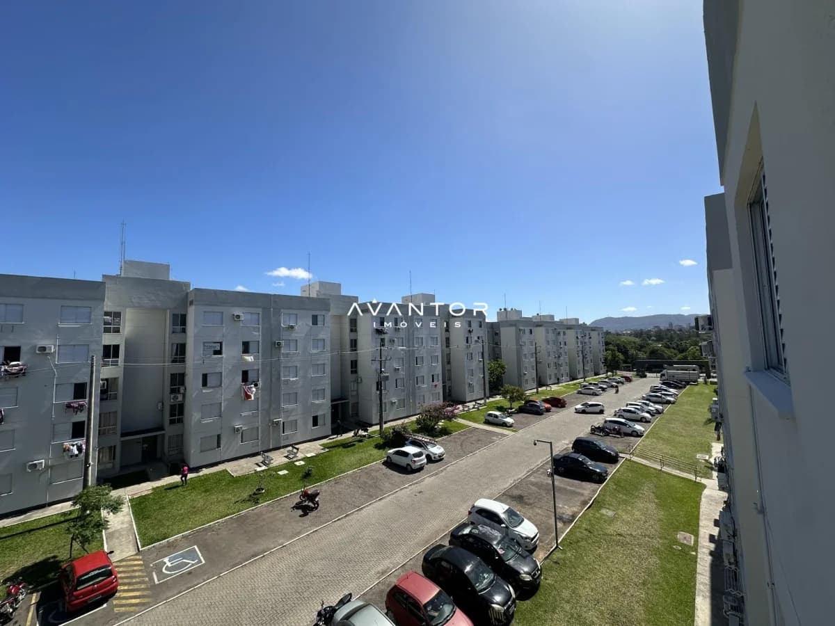 Vista do condomínio com pátio e garagem — Apartamento com 2 quartos à venda no Residencial Aruba, em Urlândia, Santa Maria/RS