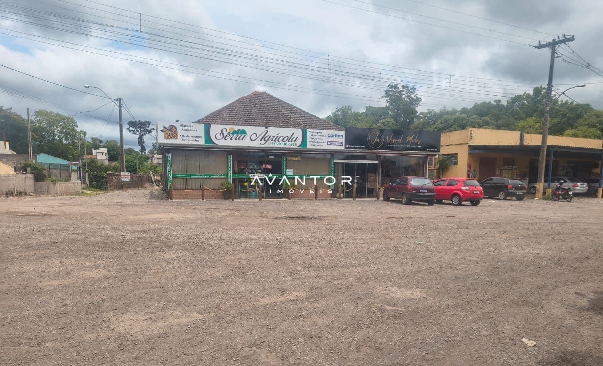 Fachada comercial com lojas e garagem — Terreno à venda em Parque Serrano I, Itaara/RS