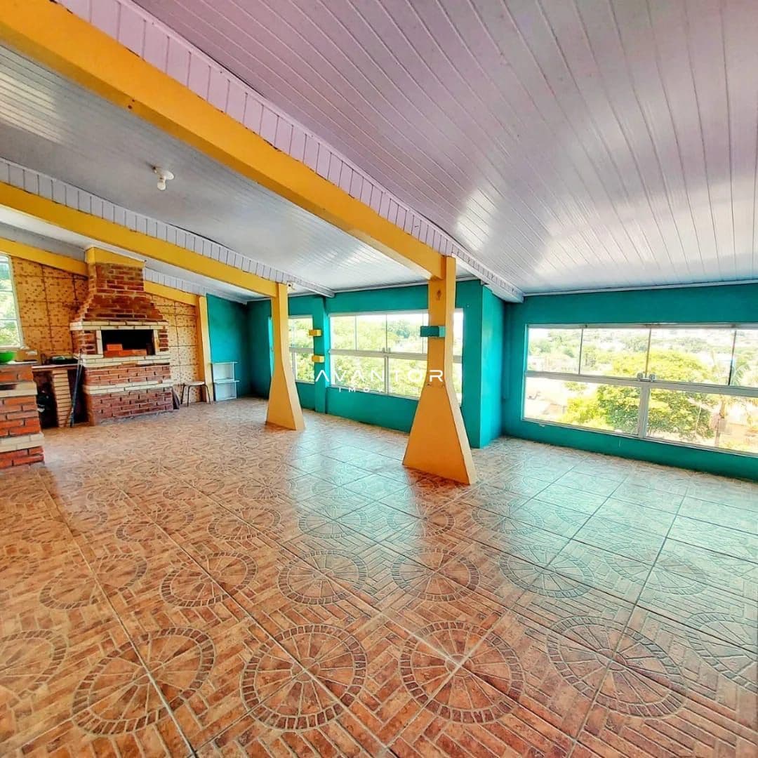 Salão de festas com churrasqueira e vista externa — Apartamento com 3 quartos à venda em Nossa Senhora do Perpétuo Socorro, Santa Maria/RS