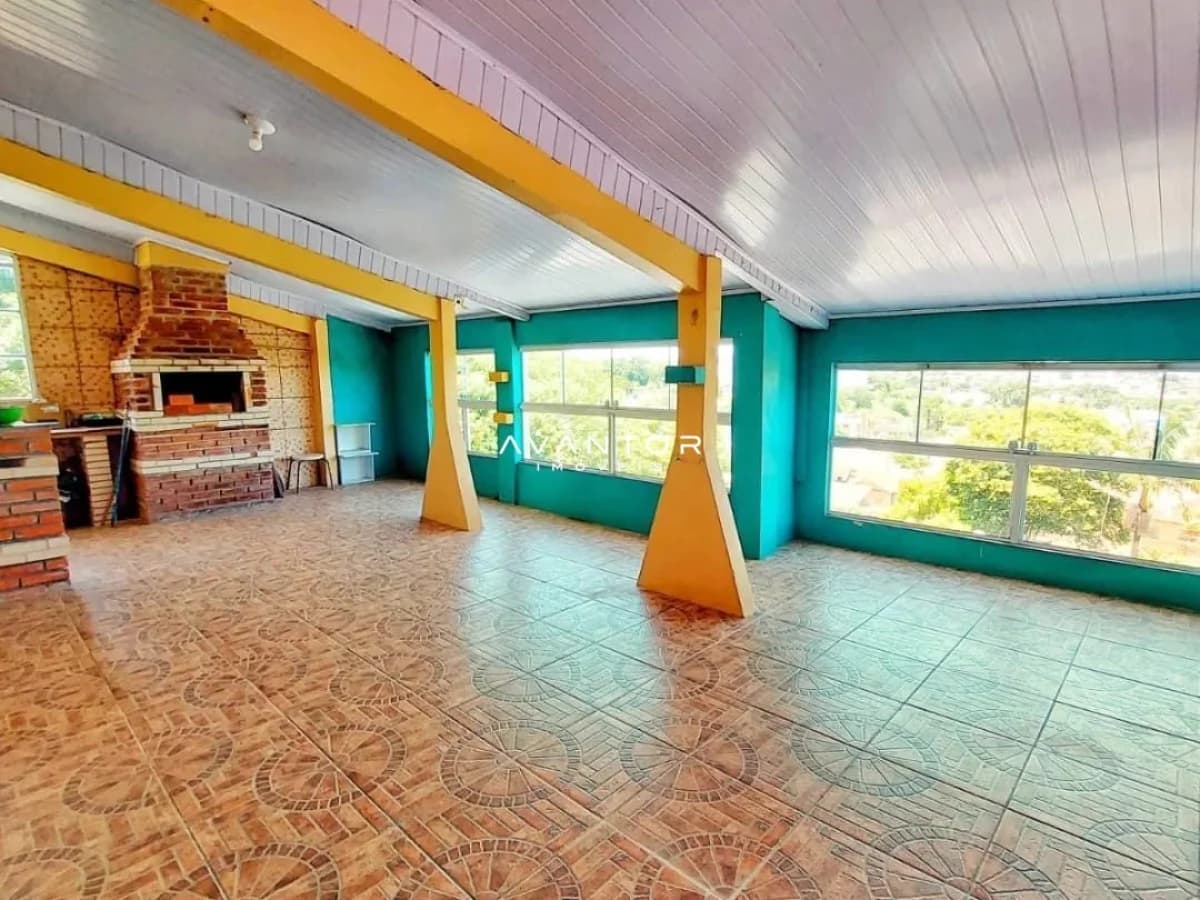 Salão de festas com churrasqueira e vista externa — Apartamento com 3 quartos à venda em Nossa Senhora do Perpétuo Socorro, Santa Maria/RS