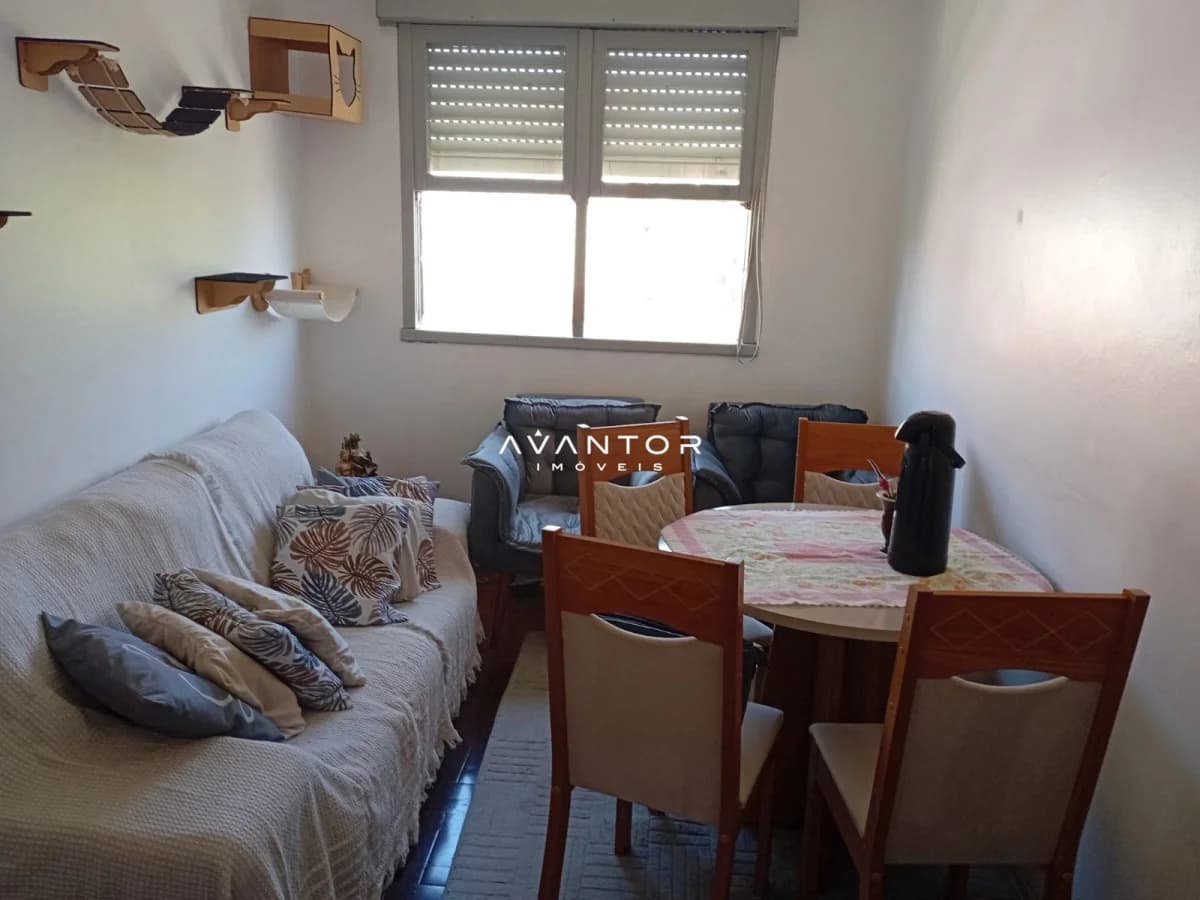 Dormitório com cama de solteiro e janela — Apartamento com 2 quartos à venda em Nossa Senhora de Lourdes, Santa Maria/RS