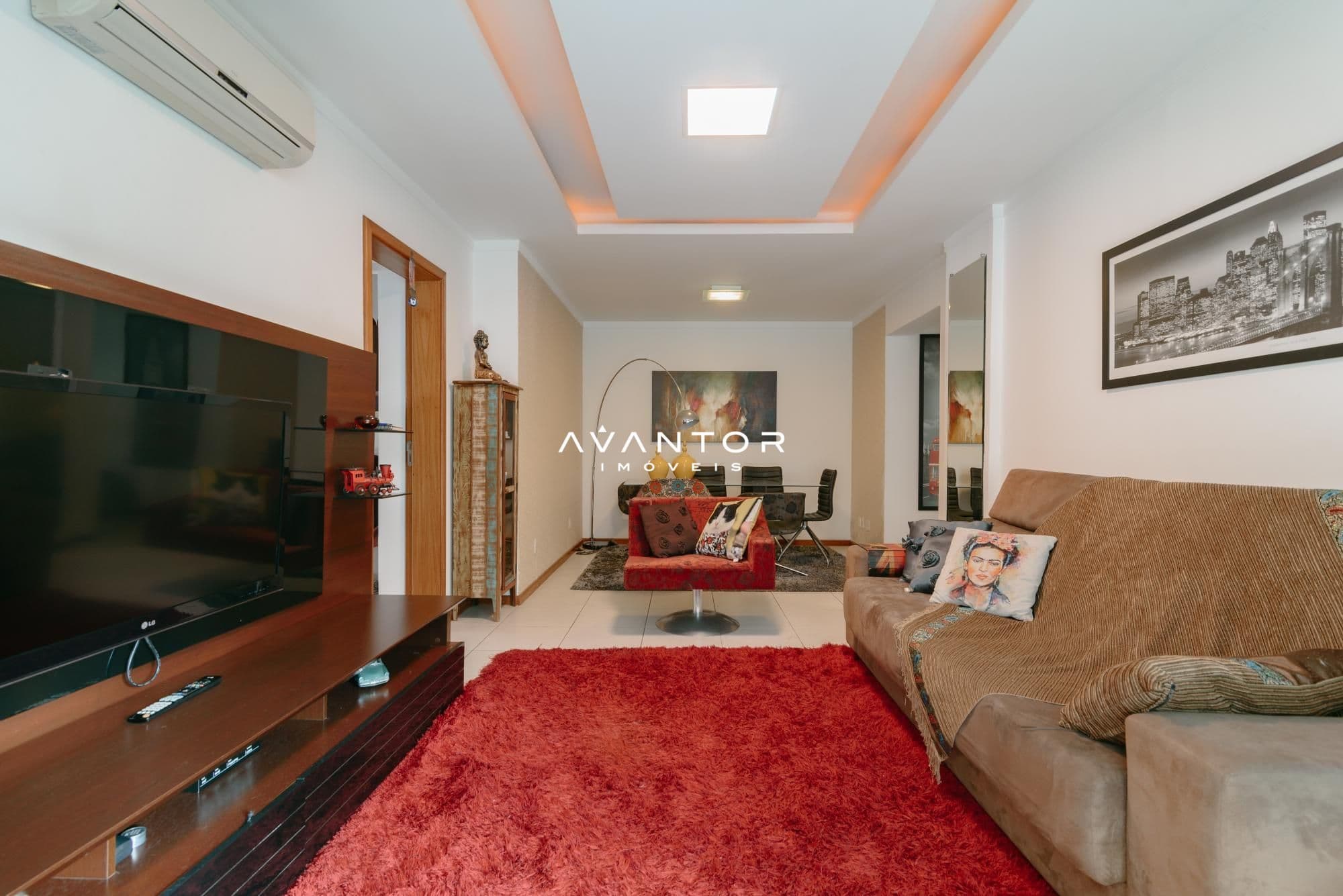 Sala de estar com sofá e TV — Apartamento com 3 quartos à venda no Edifício Costa Del Sol, em Centro, Santa Maria/RS