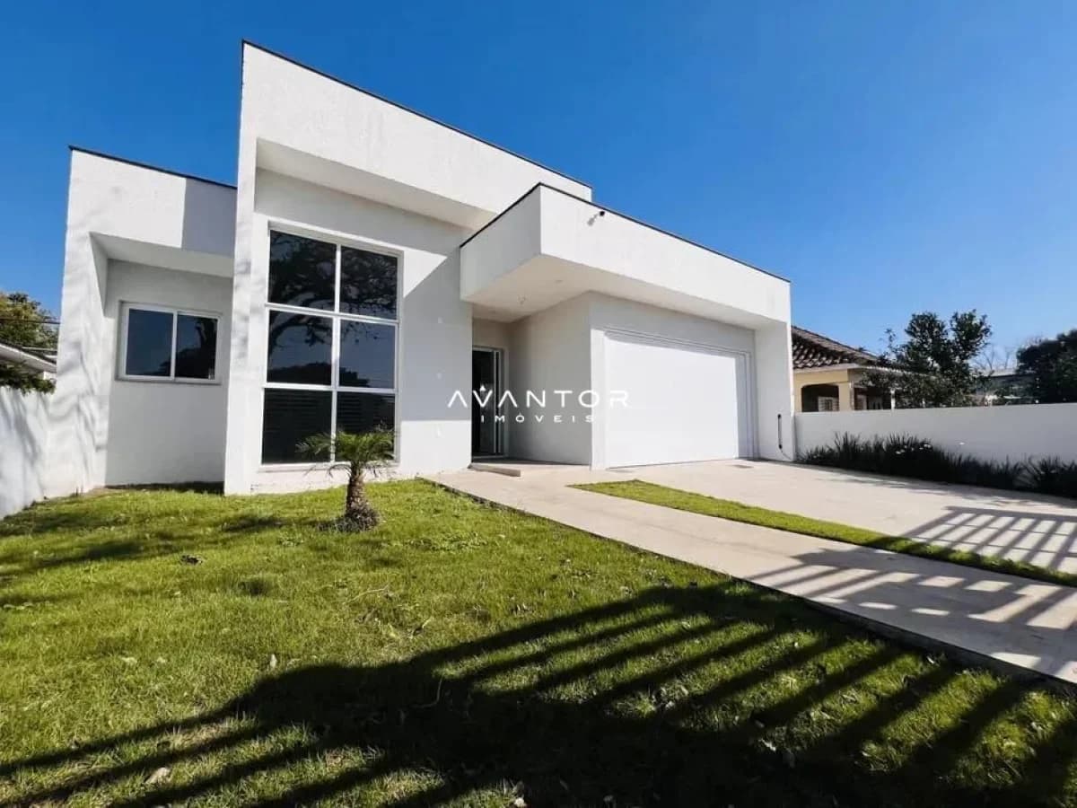 Fachada da casa com garagem — Casa com 3 quartos à venda em Camobi, Santa Maria/RS