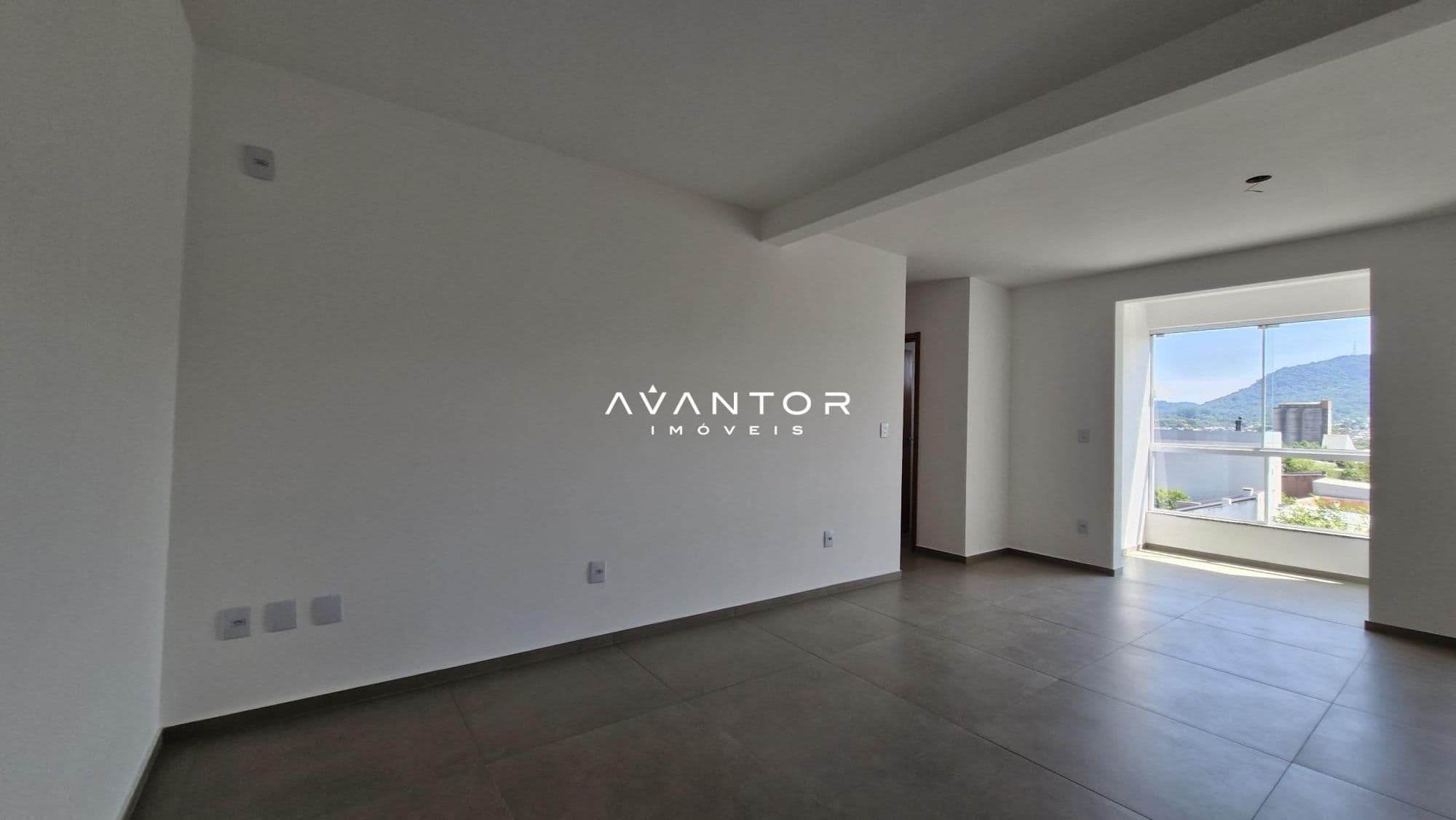 Sala de estar com sacada e vista externa — Apartamento com 2 quartos à venda em Nossa Senhora do Rosário, Santa Maria/RS