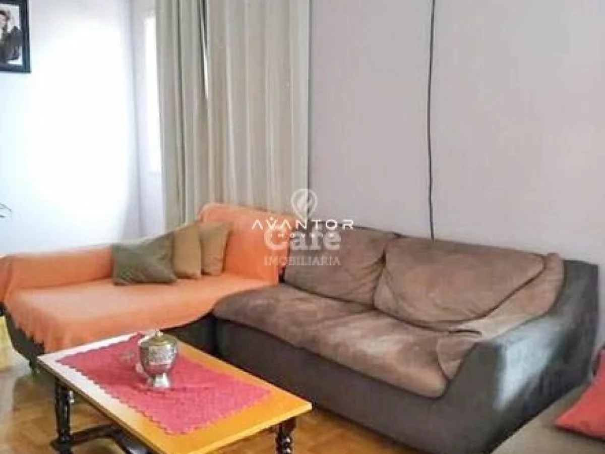 Sala de estar com sofá e mesinha de centro — Apartamento com 3 quartos à venda em Bonfim, Santa Maria/RS