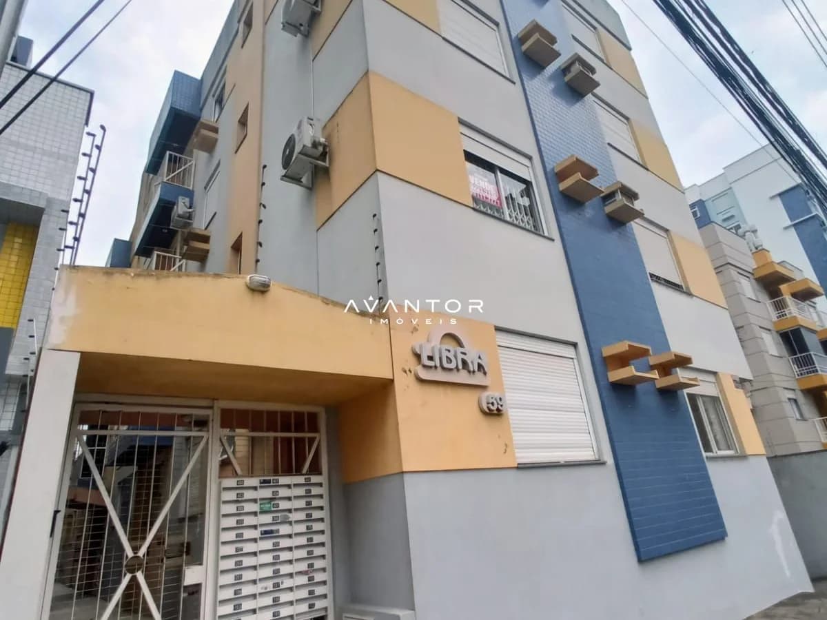 Fachada do prédio com garagens — Edifício Libra, Nossa Senhora de Fátima, Santa Maria/RS