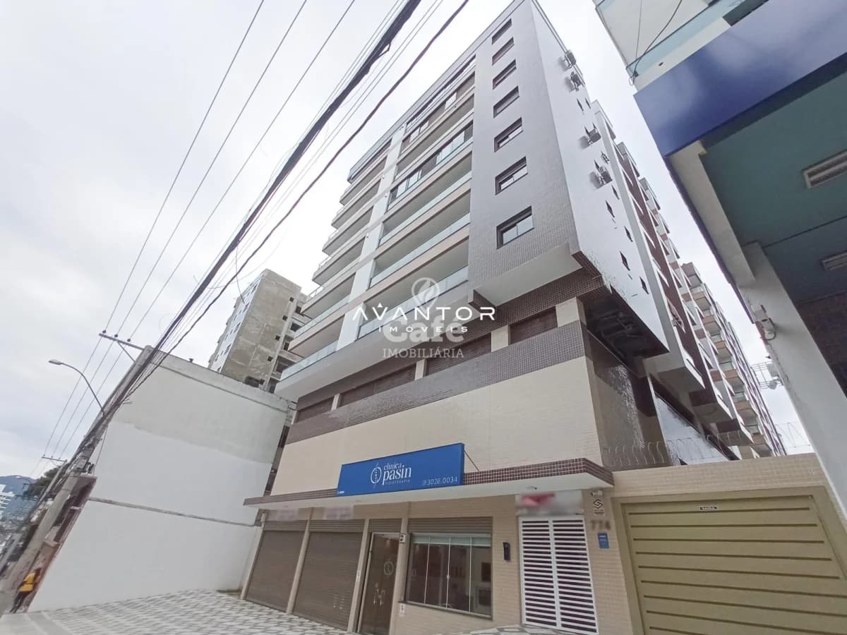 Fachada do prédio com comércio no térreo — Apartamento com 1 quarto à venda em Centro, Santa Maria/RS