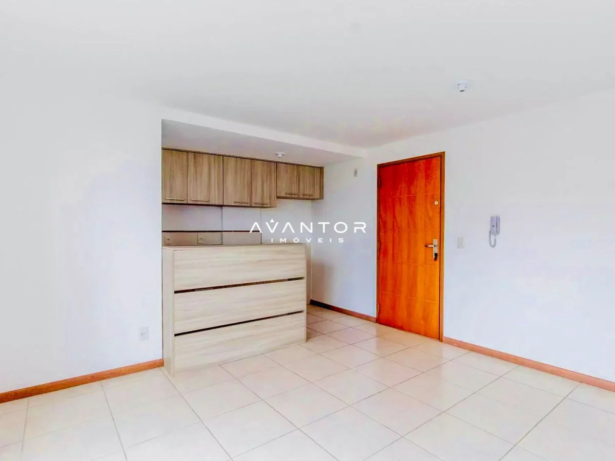 Cozinha integrada com armários planejados — Apartamento com 1 quarto à venda em Nossa Senhora de Fátima, Santa Maria/RS