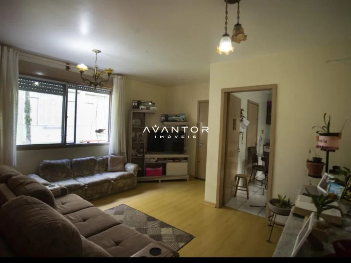 Sala de estar com sofás e TV — Apartamento com 2 quartos à venda em Nossa Senhora de Fátima, Santa Maria/RS