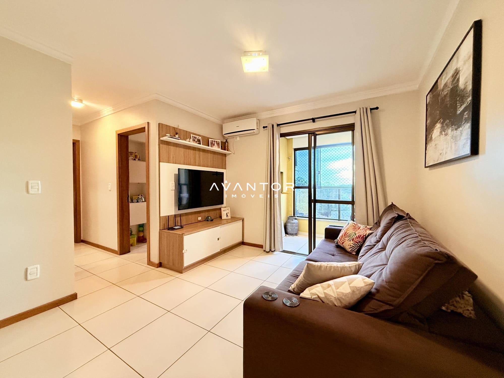 Sala de estar com sacada integrada — Apartamento com 3 quartos à venda em Uglione, Santa Maria/RS