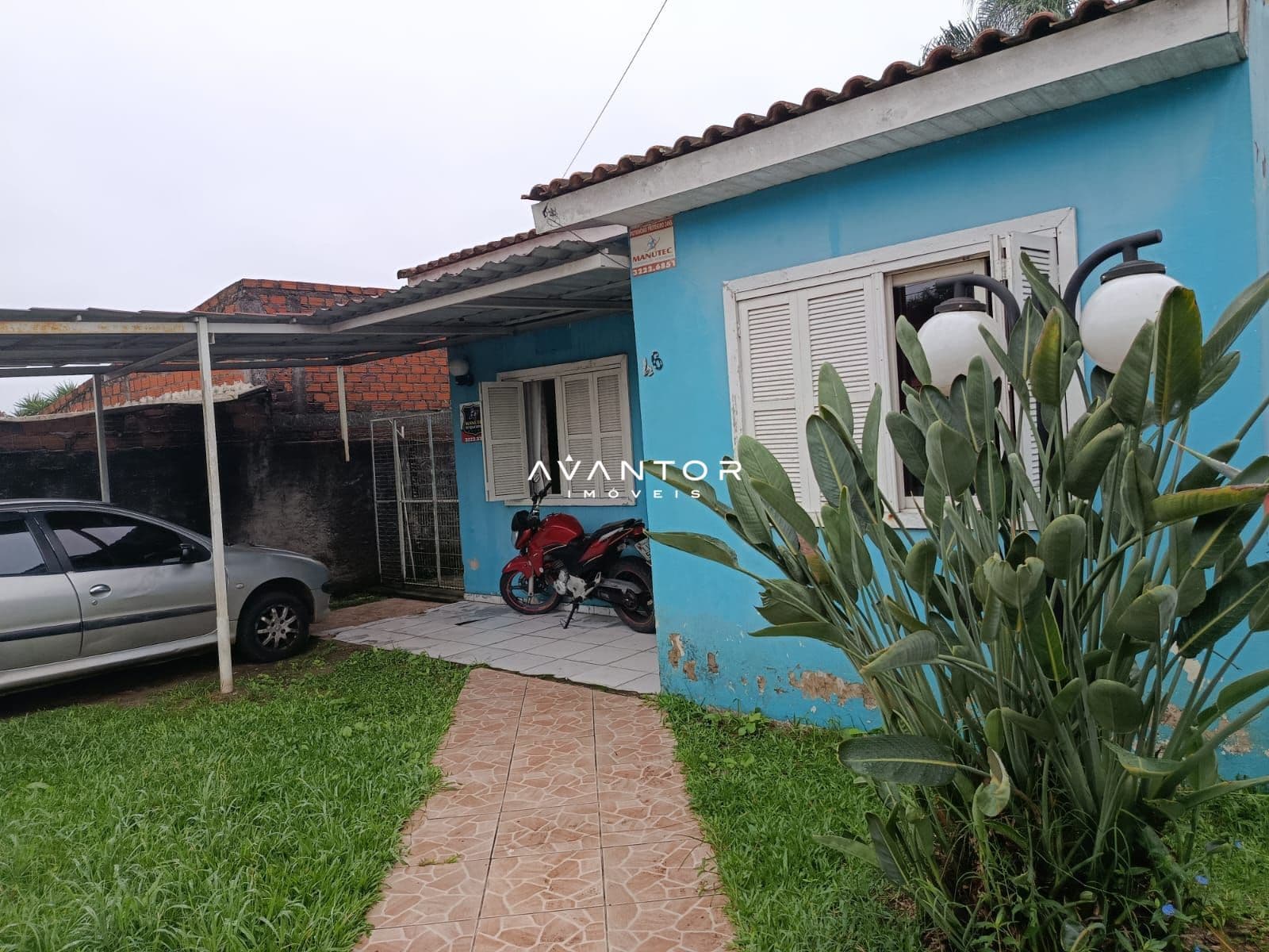 Fachada da casa com área externa — Casa com 2 quartos à venda em Carolina, Santa Maria/RS