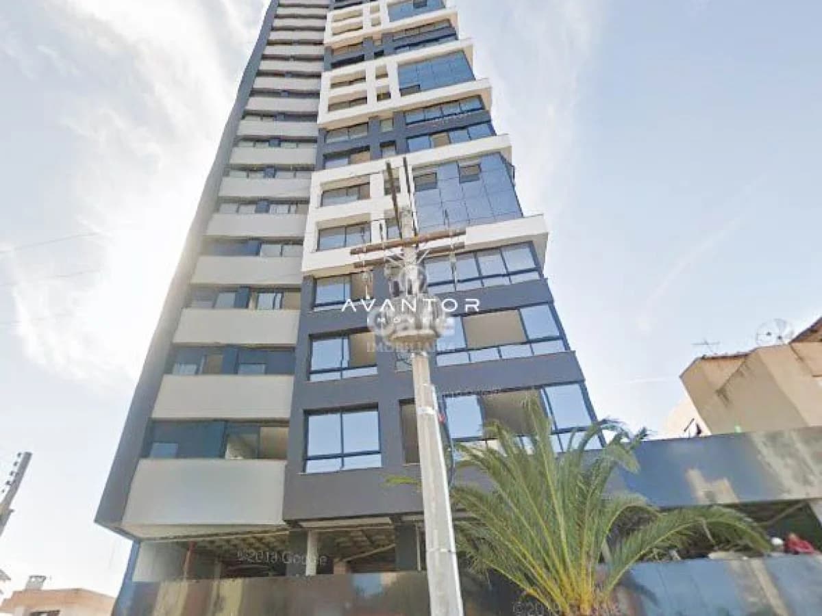 Fachada do prédio com múltiplos andares — Condomínio Enseada, Praia Itapeva, Torres/RS