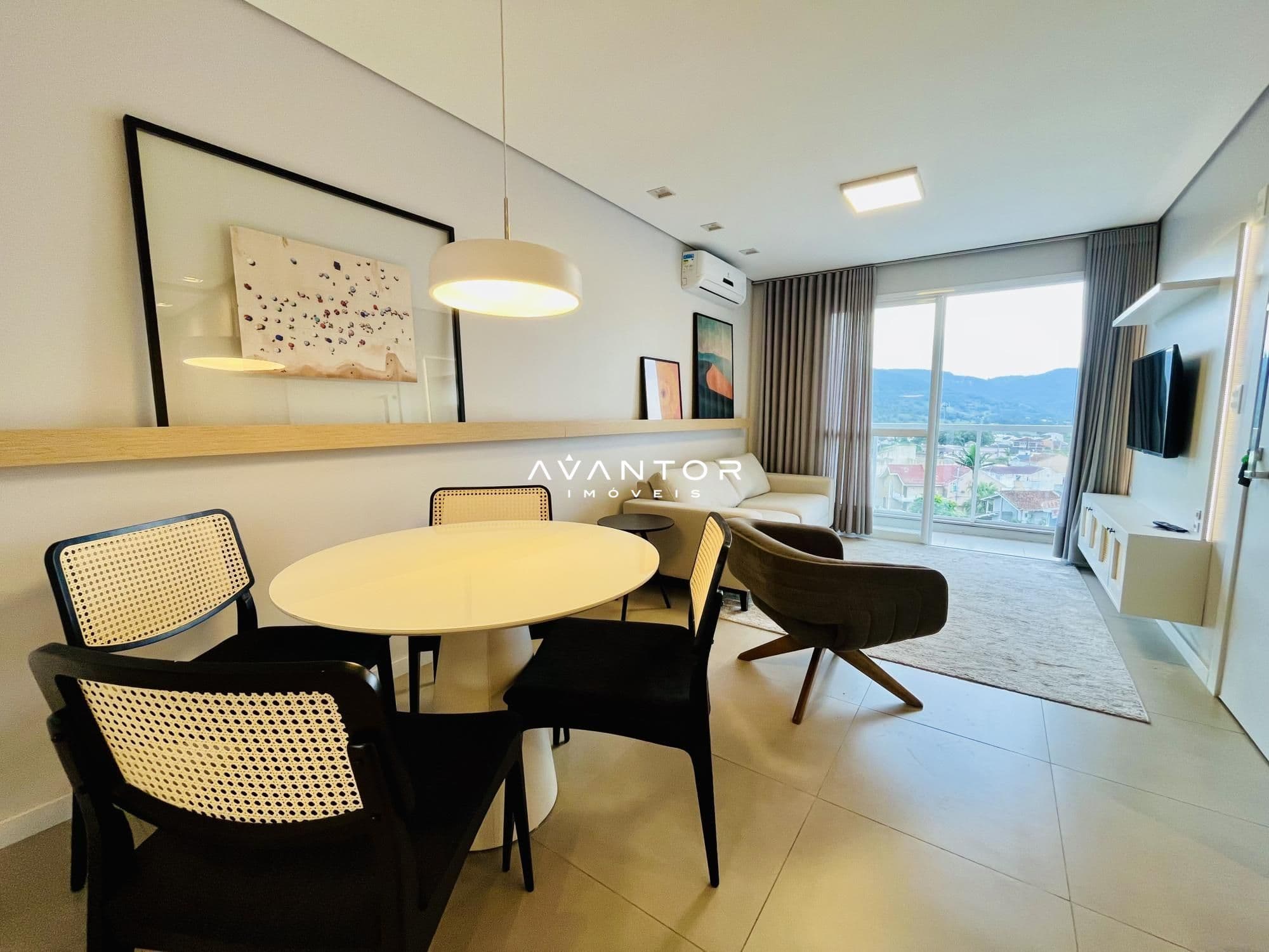 Sala de estar integrada à cozinha com vista — Apartamento com 2 quartos à venda em São José, Santa Maria/RS