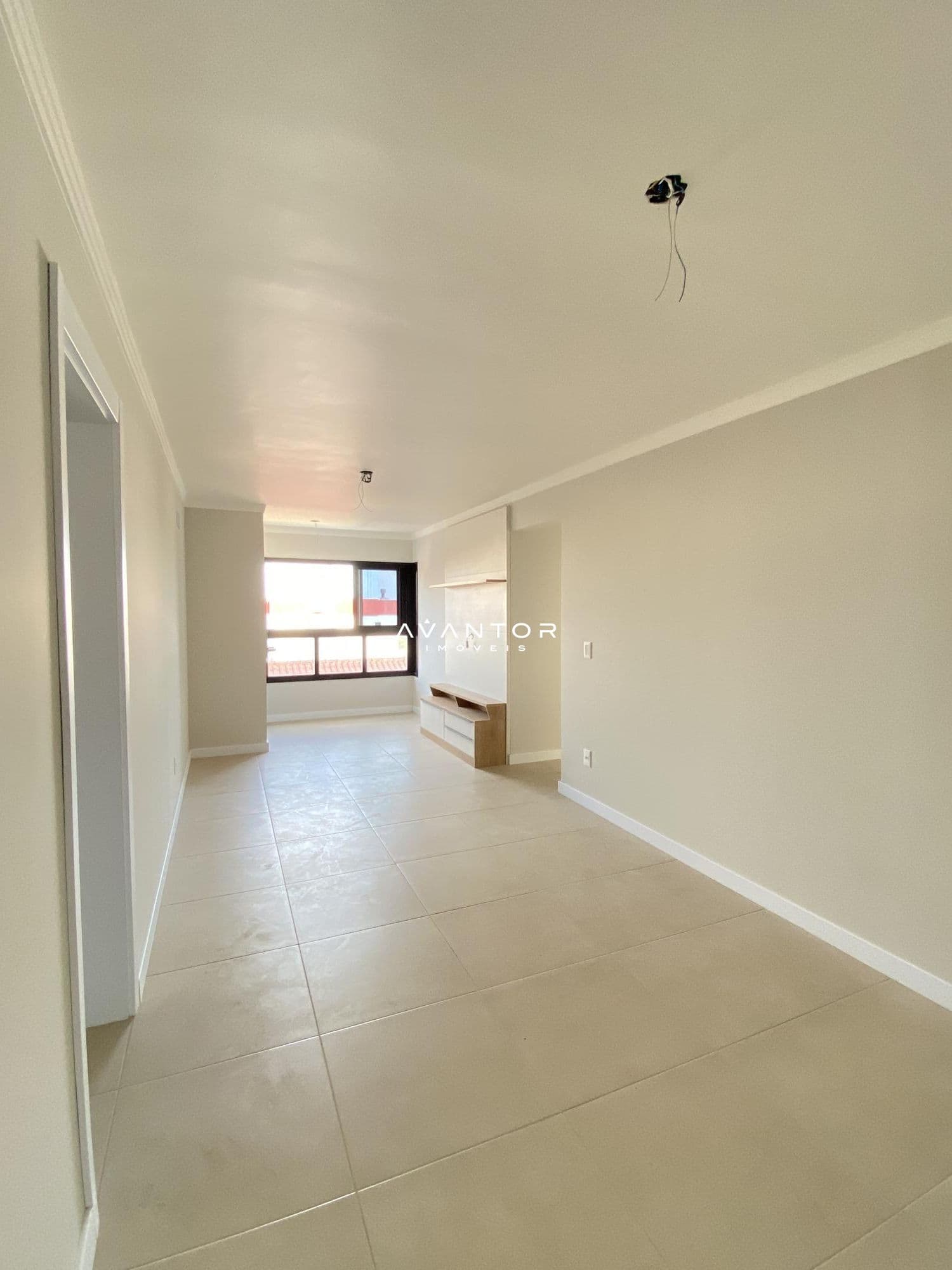 Sala de estar integrada à cozinha — Apartamento com 1 quarto à venda em Nossa Senhora de Fátima, Santa Maria/RS