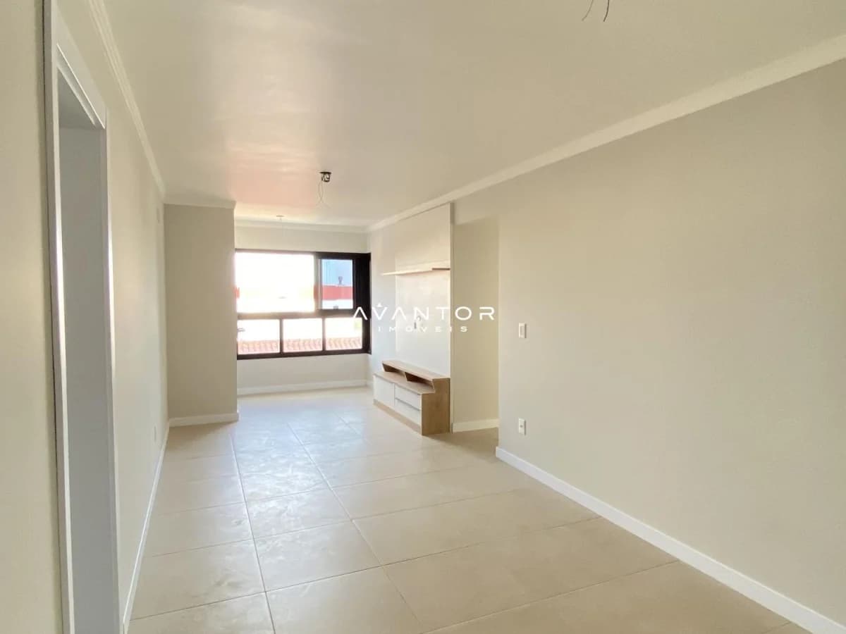 Sala de estar integrada à cozinha — Apartamento com 1 quarto à venda em Nossa Senhora de Fátima, Santa Maria/RS