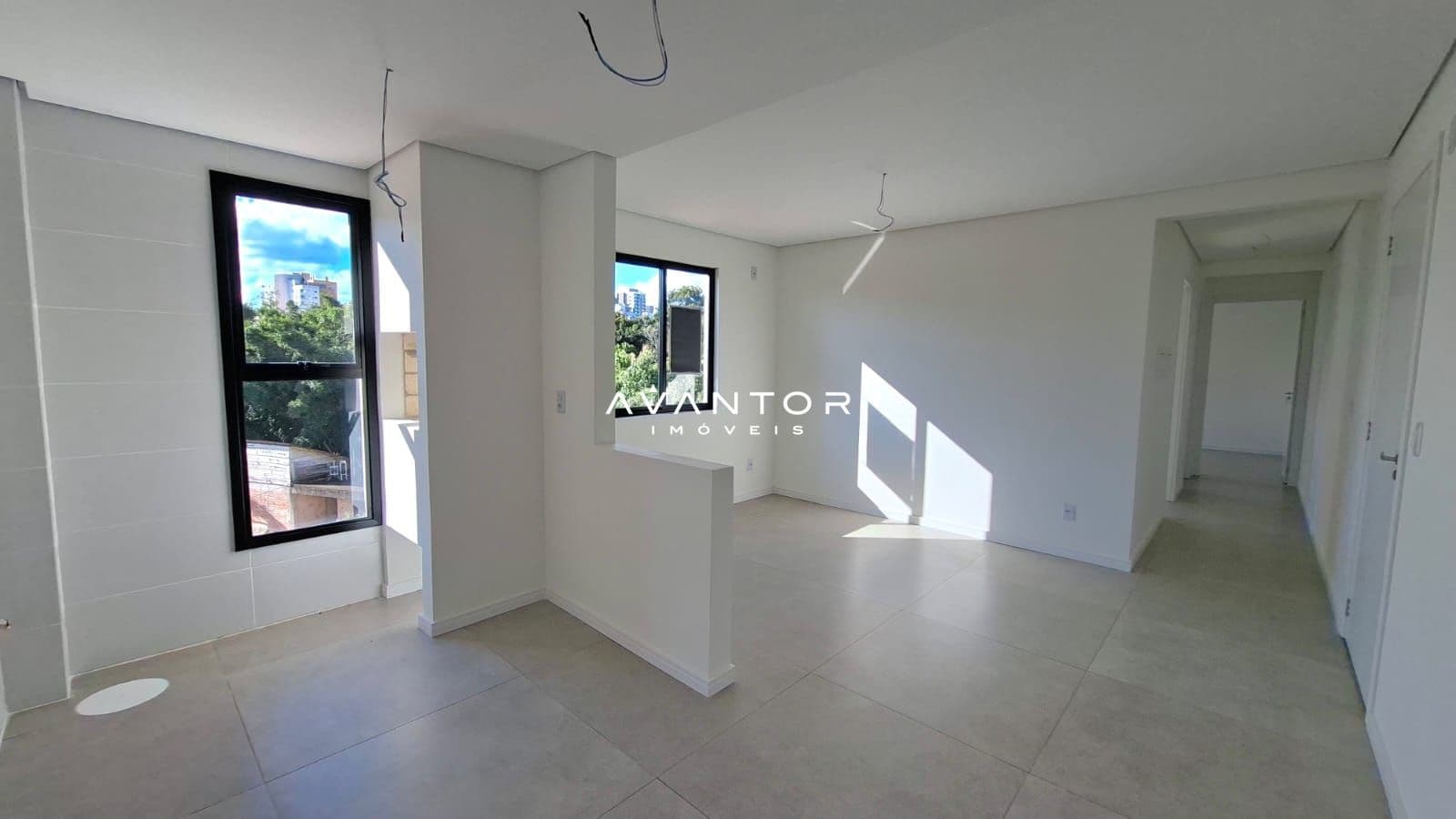 Sala de estar integrada à cozinha — Apartamento com 2 quartos à venda em Nossa Senhora Medianeira, Santa Maria/RS
