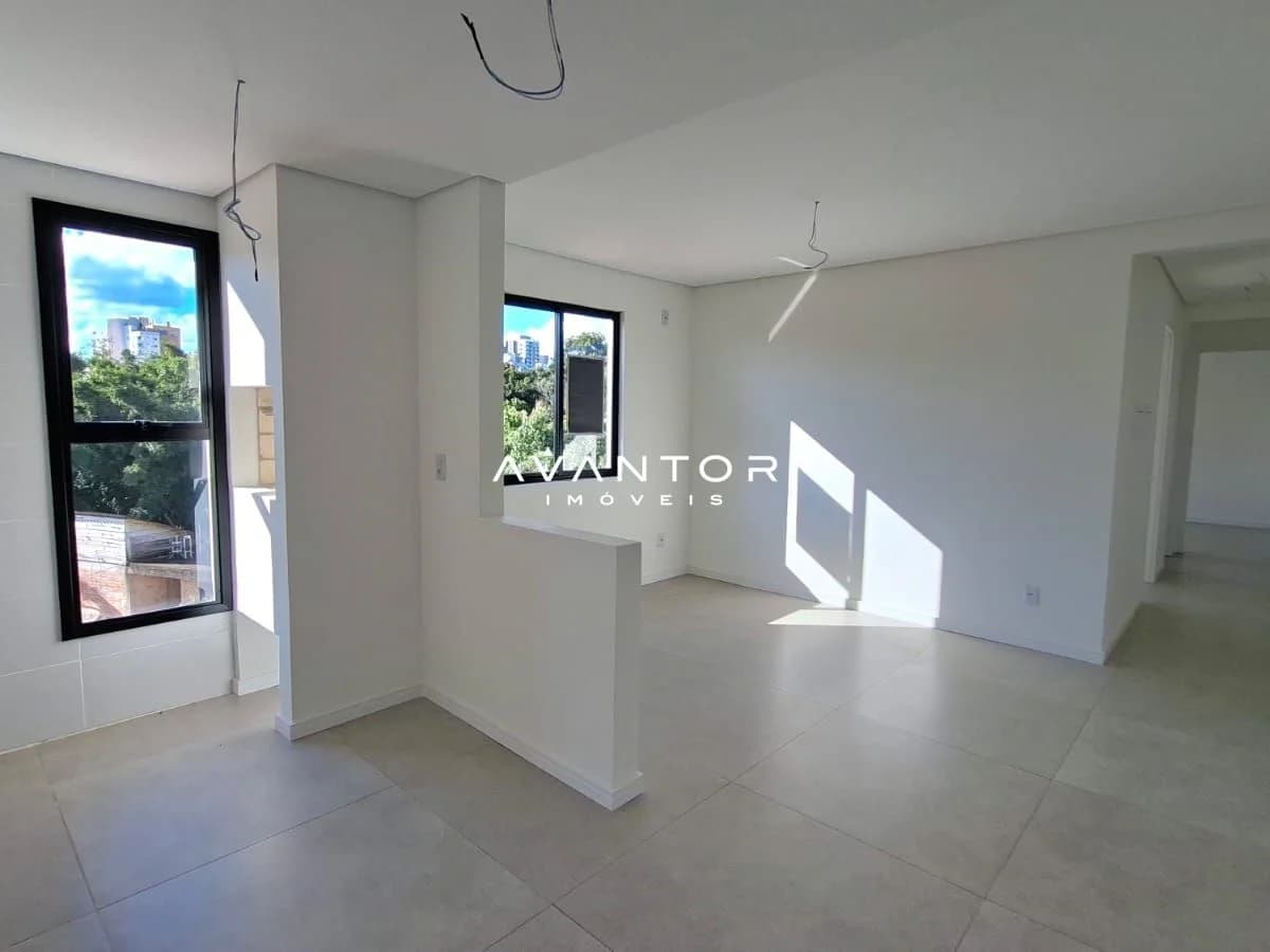 Sala de estar integrada à cozinha — Apartamento com 2 quartos à venda em Nossa Senhora Medianeira, Santa Maria/RS