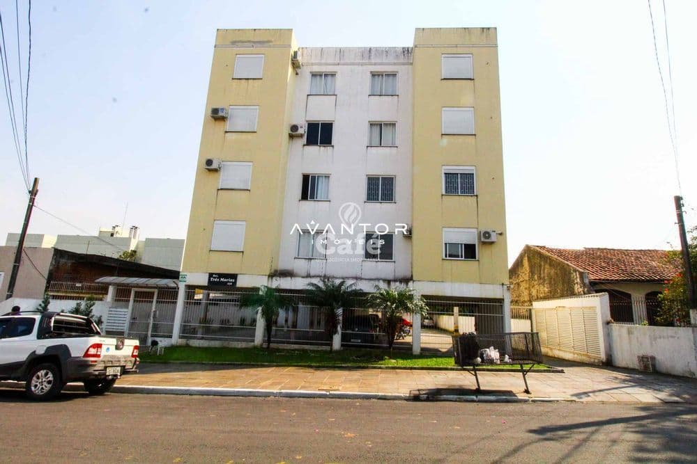 Fachada do prédio com lojas no térreo — Apartamento com 1 quarto à venda em Duque de Caxias, Santa Maria/RS