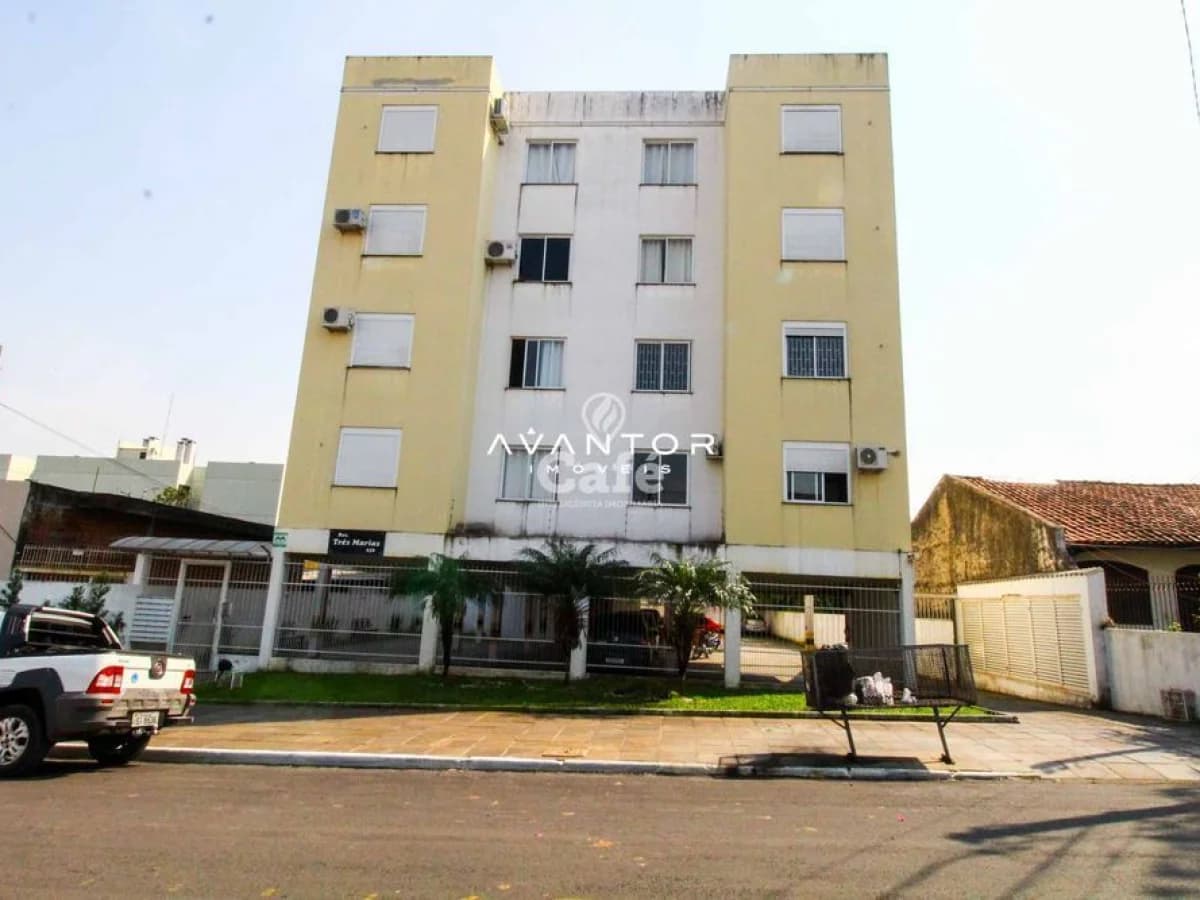 Fachada do prédio com lojas no térreo — Apartamento com 1 quarto à venda em Duque de Caxias, Santa Maria/RS