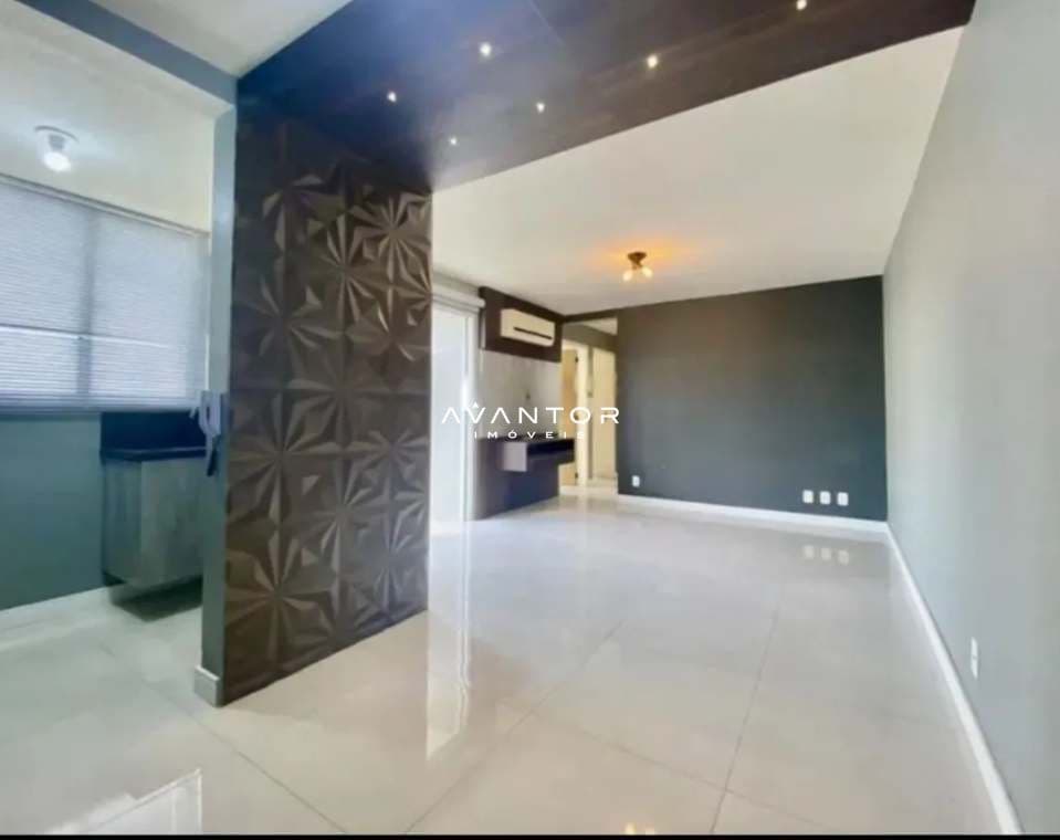 Sala integrada com divisória decorativa — Apartamento com 3 quartos à venda em Nossa Senhora Medianeira, Santa Maria/RS
