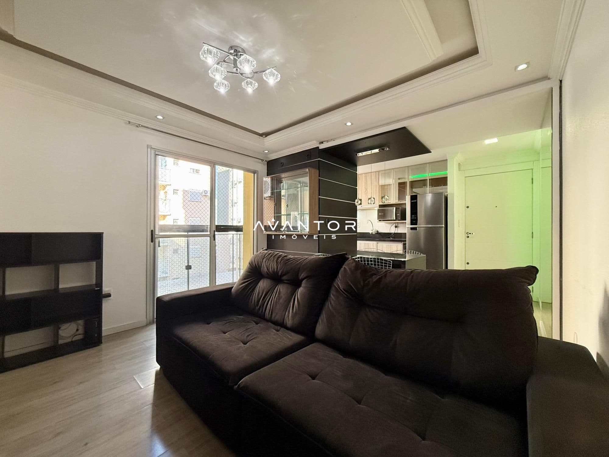 Sala de estar com sacada e cozinha integrada — Apartamento com 3 quartos à venda em Nossa Senhora Medianeira, Santa Maria/RS