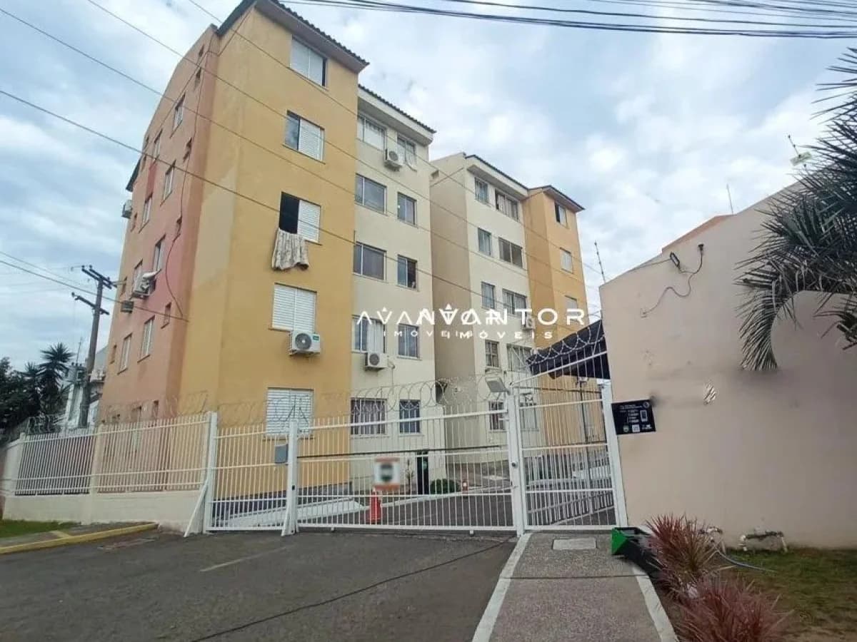 Fachada do prédio com portão — Conjunto Residencial Luis Bavaresco, Uglione, Santa Maria/RS