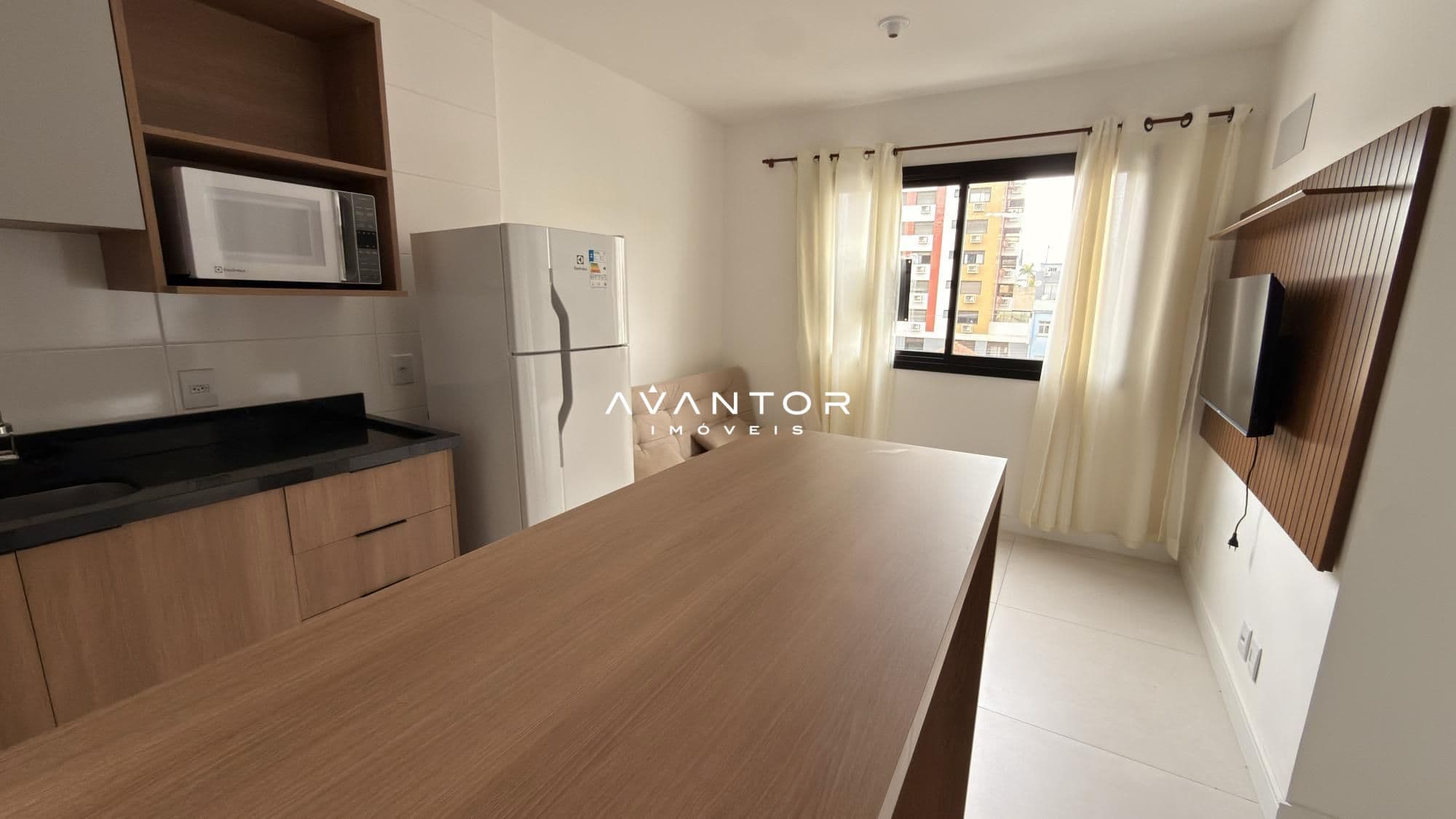 Cozinha com bancada e armários planejados — Apartamento com 1 quarto à venda no Residencial VIVANT, em Centro, Santa Maria/RS