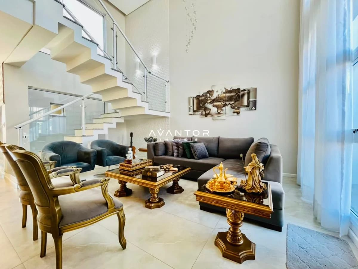 Sala de estar com escada integrada — Casa com 4 quartos à venda em São José, Santa Maria/RS