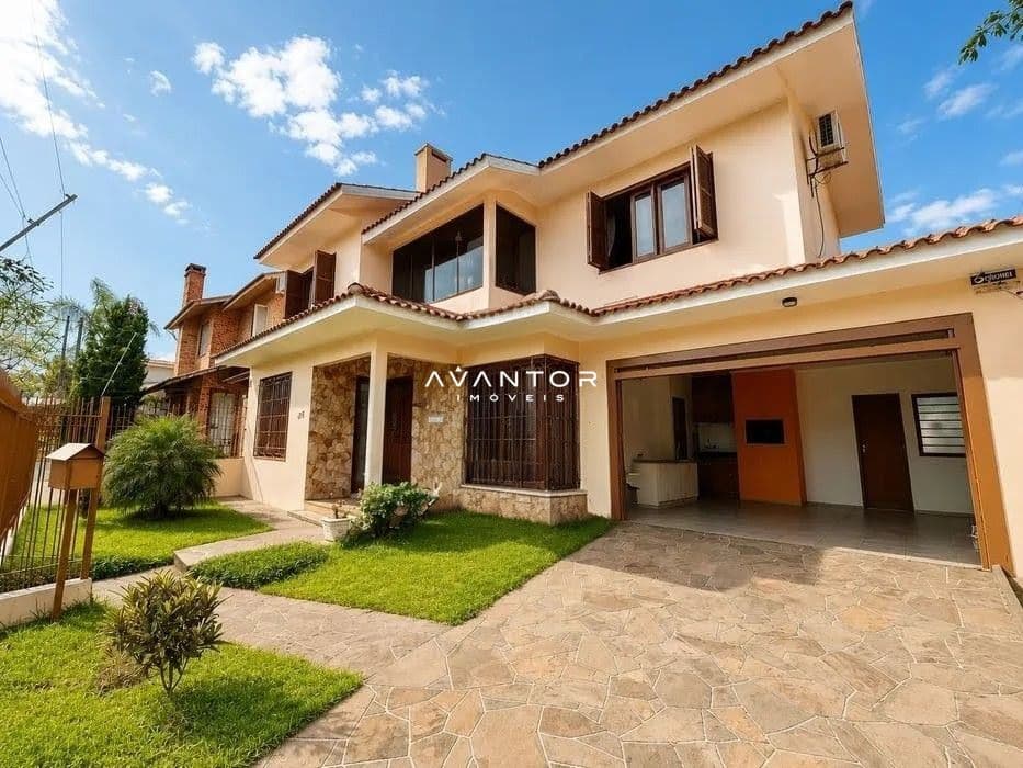 Fachada da casa com garagem — Casa com 4 quartos à venda em São José, Santa Maria/RS