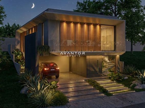 Fachada da casa à noite com garagem — Casa com 3 quartos à venda no Estância dos Montes, em Tomazetti, Santa Maria/RS