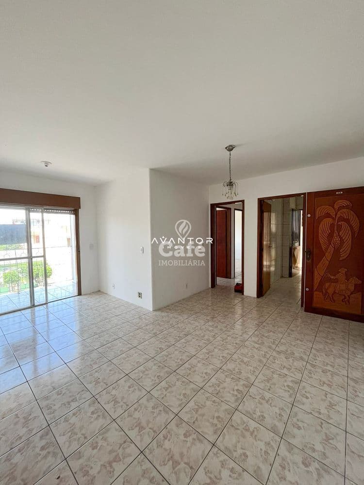 Sala de estar com acesso à sacada — Apartamento com 2 quartos à venda em Camobi, Santa Maria/RS