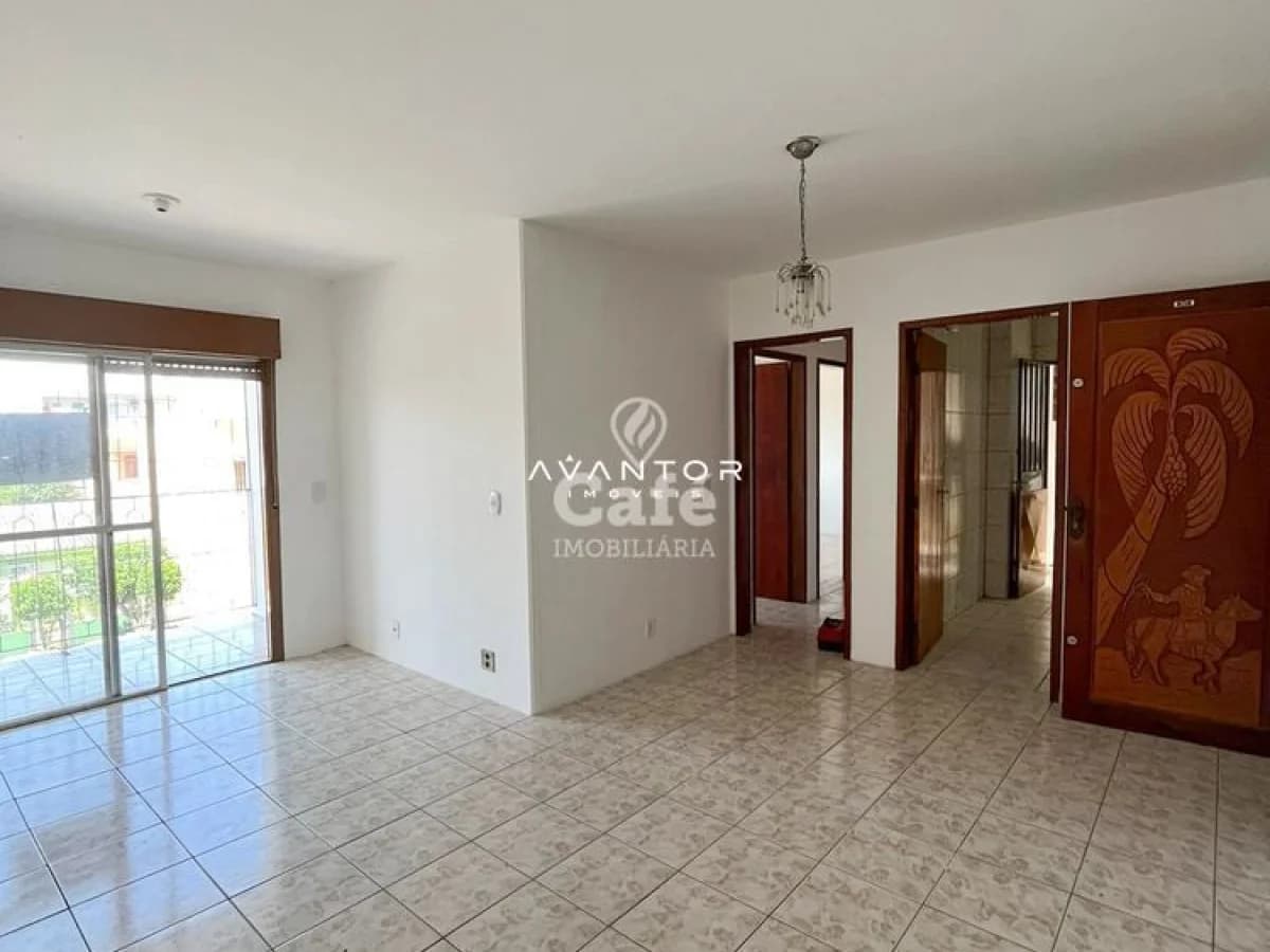 Sala de estar com acesso à sacada — Apartamento com 2 quartos à venda em Camobi, Santa Maria/RS