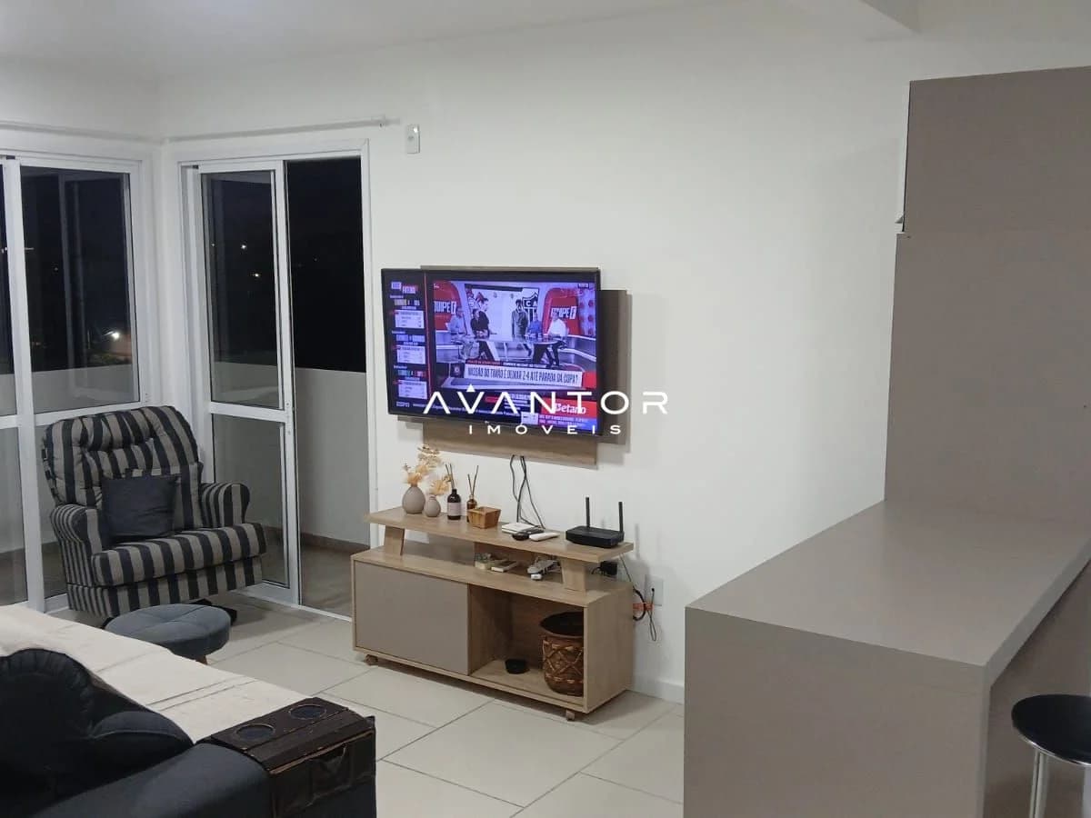 Sala de estar com sacada — Apartamento com 1 quarto para alugar no Edifício Tempus, em Camobi, Santa Maria/RS