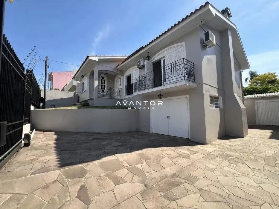 Fachada da casa com garagem — Casa com 3 quartos para alugar em Presidente João Goulart, Santa Maria/RS
