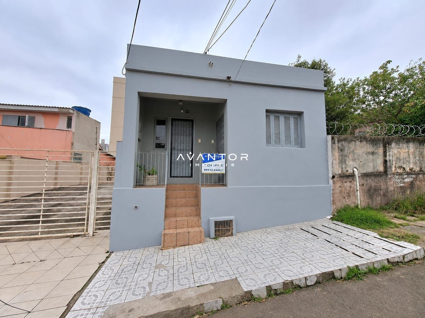 Fachada da casa com entrada frontal — Casa com 3 quartos à venda em Nossa Senhora de Lourdes, Santa Maria/RS