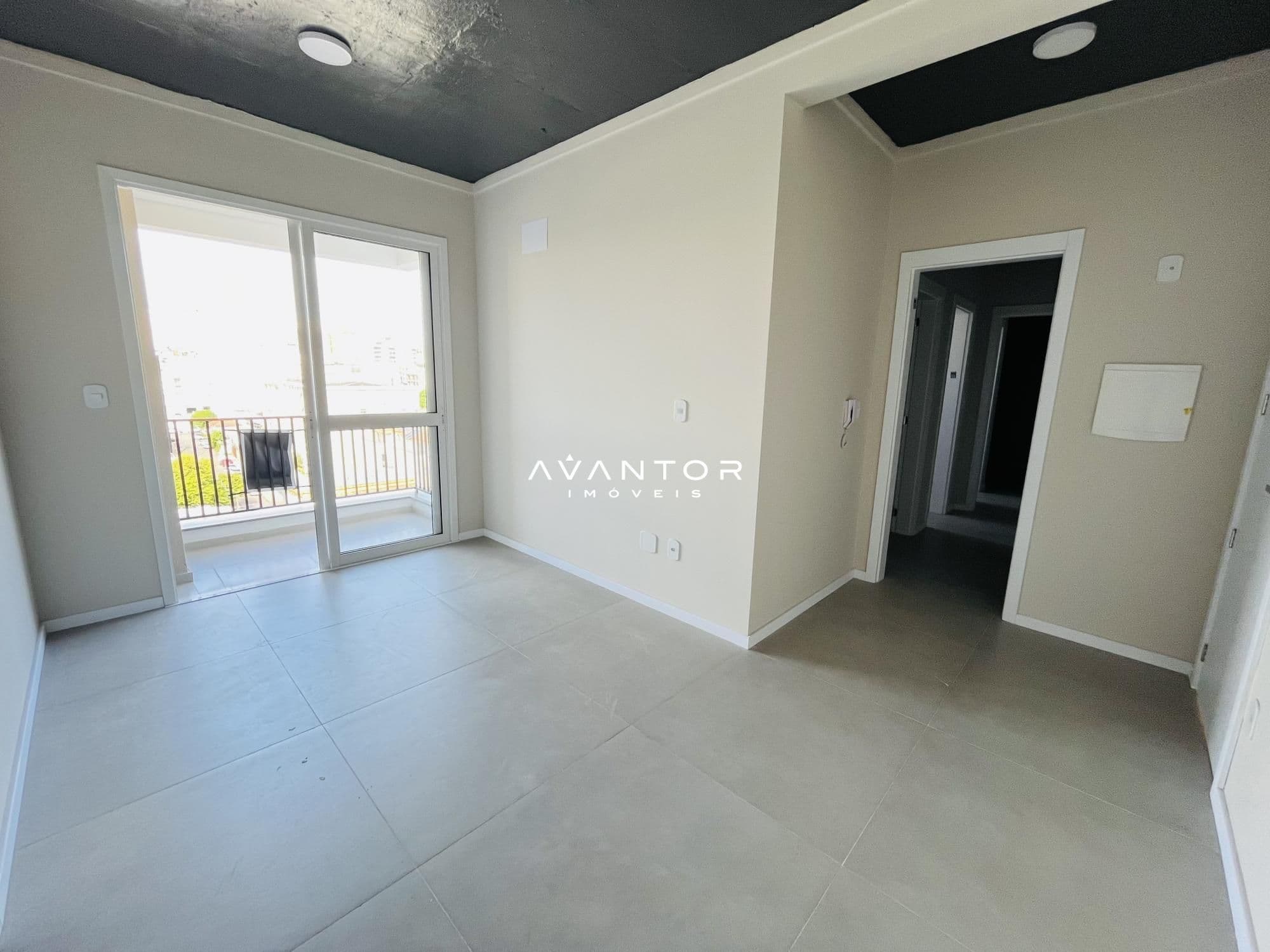 Sala integrada com sacada — Apartamento com 2 quartos para alugar no Residencial Regato, em Centro, Santa Maria/RS