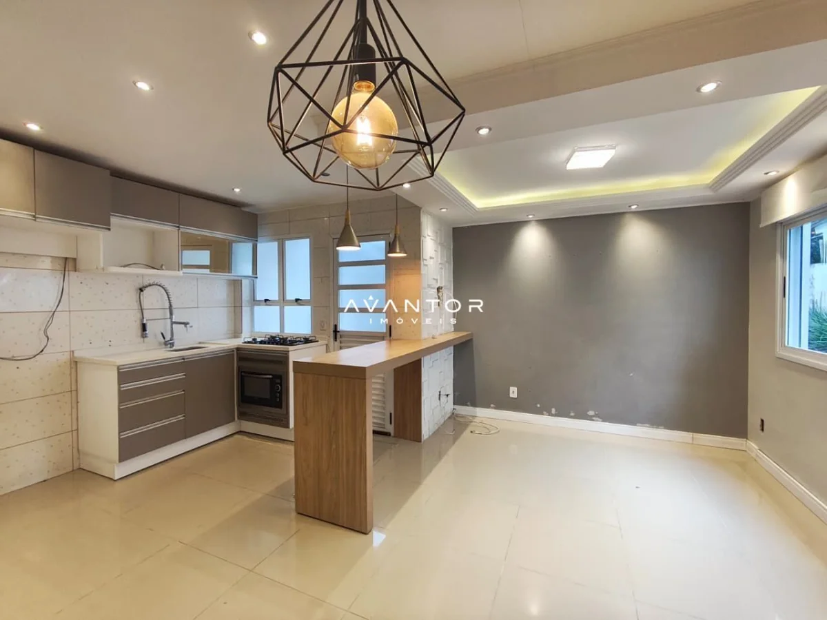 Cozinha integrada à sala com bancada — Casa com 2 quartos à venda em Pinheiro Machado, Santa Maria/RS