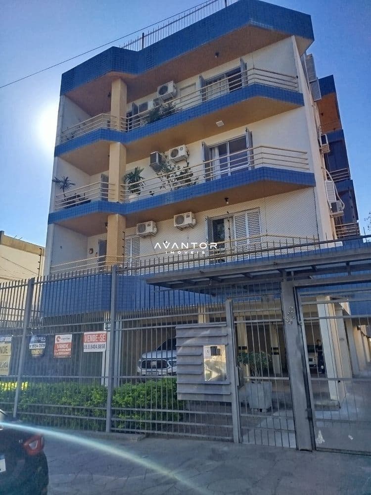 Fachada do prédio com sacadas e ar-condicionado — Apartamento com 2 quartos à venda em Nossa Senhora de Fátima, Santa Maria/RS