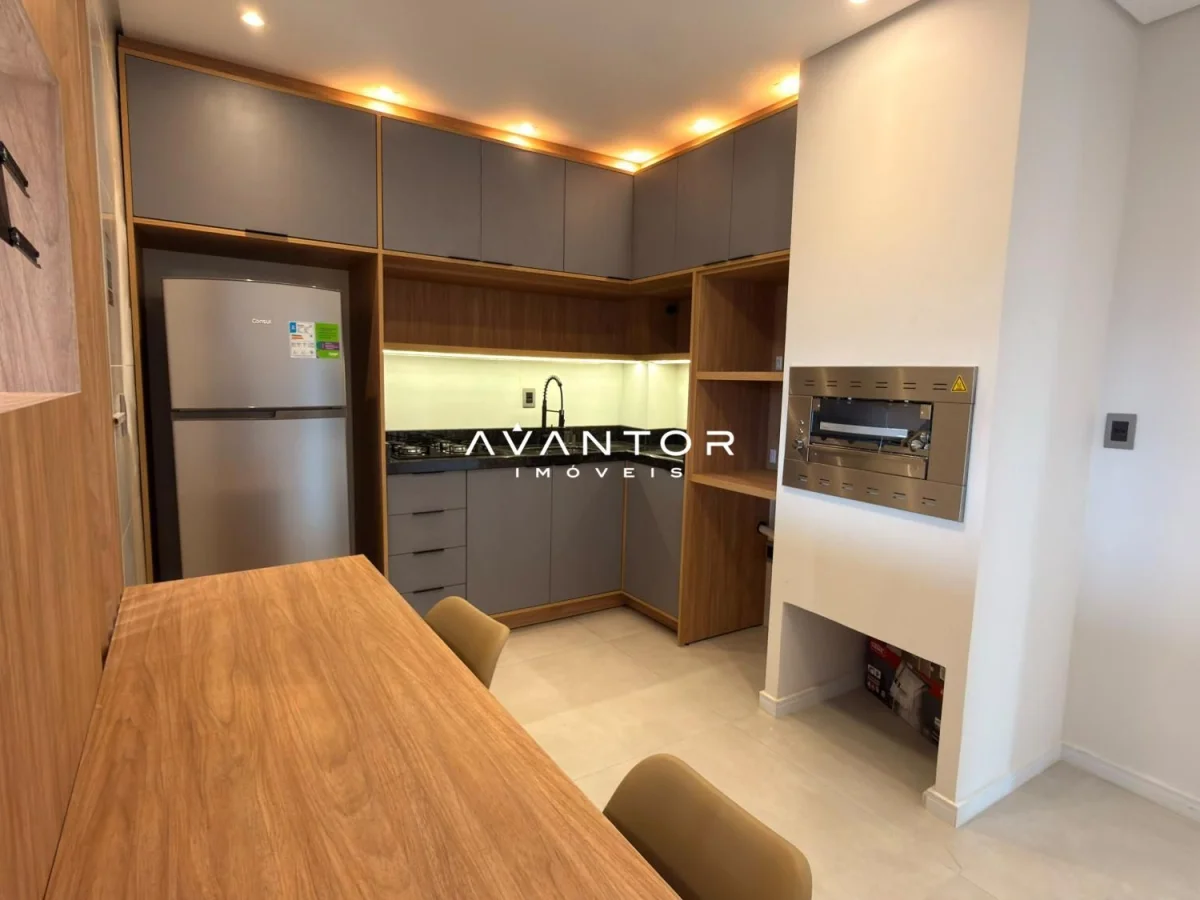 Cozinha com armários planejados — Studio com 1 quarto para alugar no Edifício Studio Alfa, em Camobi, Santa Maria/RS