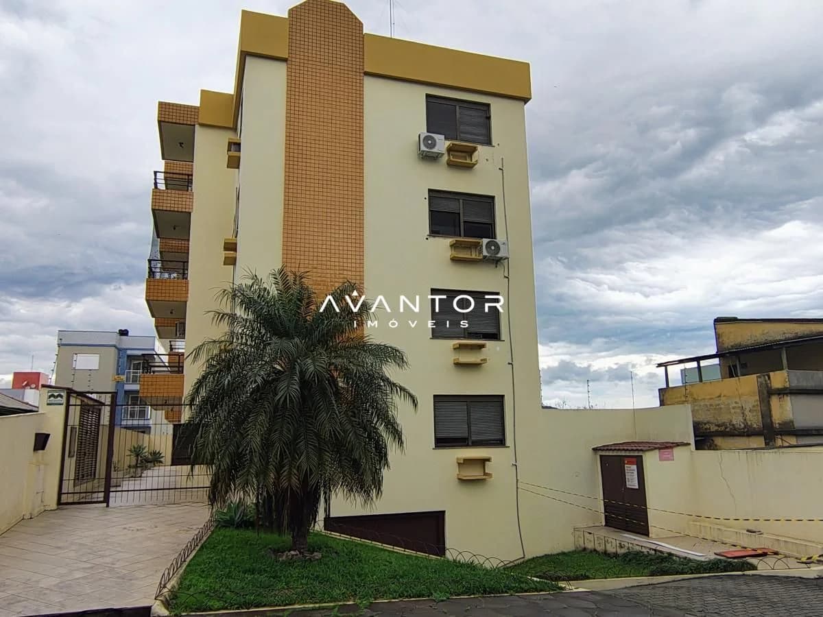 Fachada do prédio com área verde — Apartamento com 2 quartos à venda em Nossa Senhora das Dores, Santa Maria/RS
