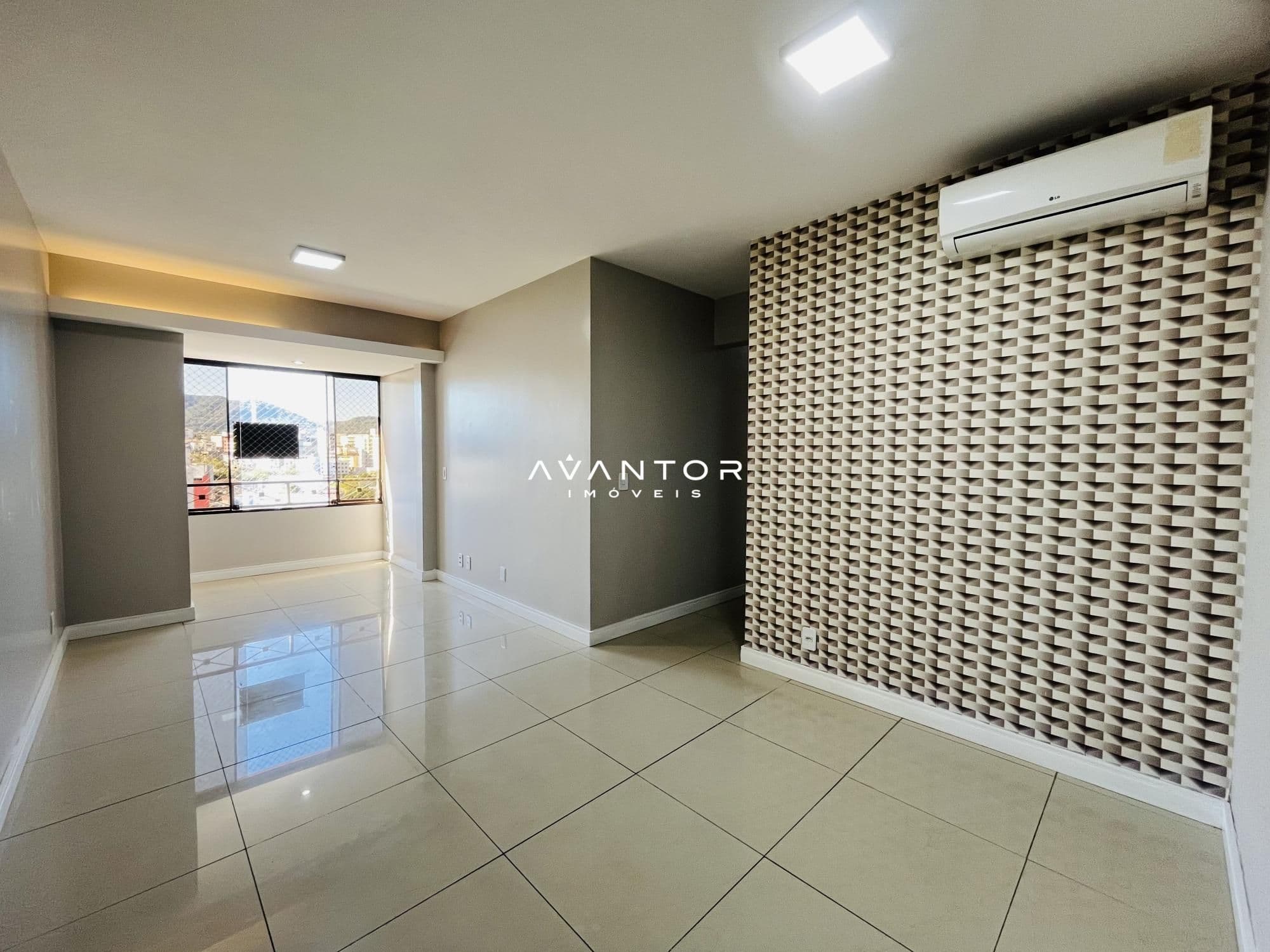 Sala de estar com parede texturizada — Apartamento com 3 quartos à venda em Nossa Senhora de Lourdes, Santa Maria/RS