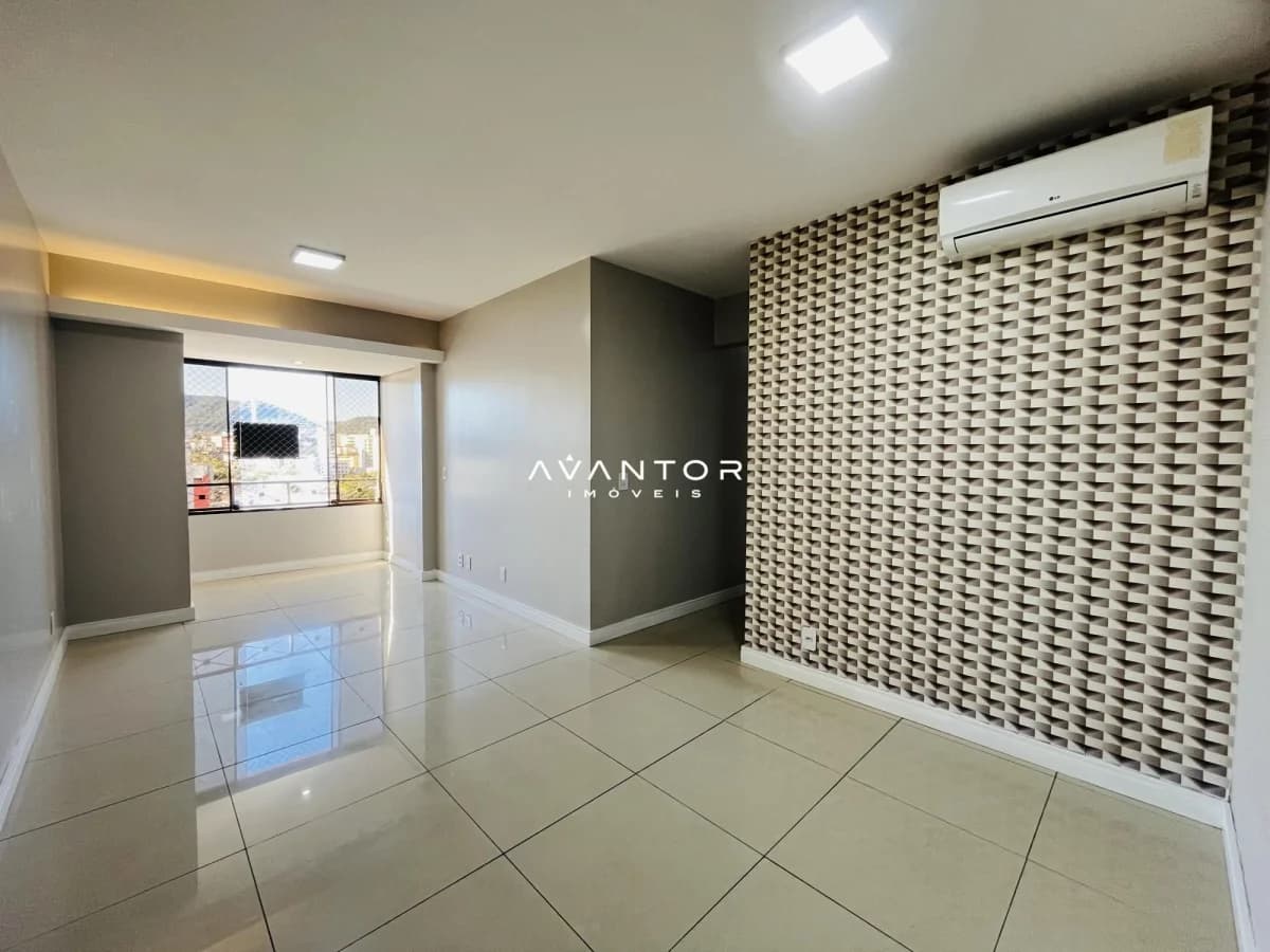 Sala de estar com parede texturizada — Apartamento com 3 quartos à venda em Nossa Senhora de Lourdes, Santa Maria/RS