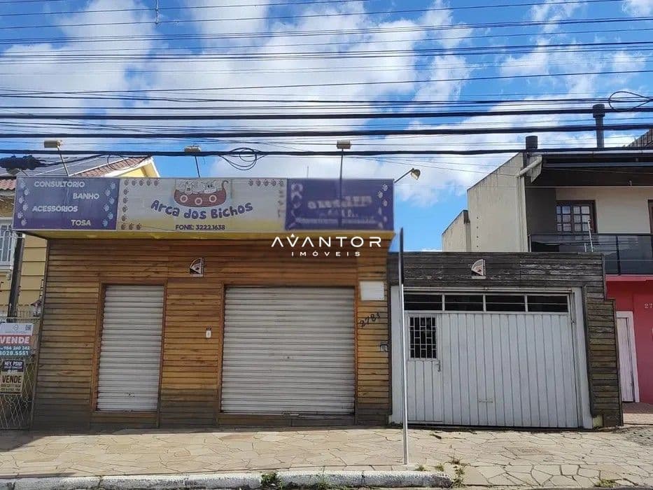 Fachada de lojas comerciais na rua — Casa Comercial com 2 salas à venda em Nonoai, Santa Maria/RS