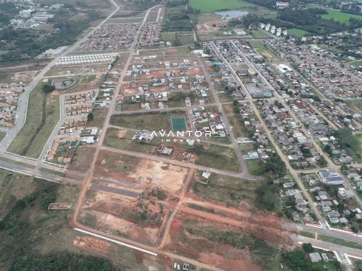 Vista aérea de loteamento e terrenos — Terreno à venda em Diácono João Luiz Pozzobon, Santa Maria/RS