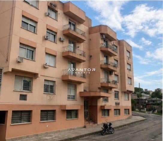 Fachada do prédio com sacadas — Apartamento com 1 quarto à venda no Ed. Jupter, em Nossa Senhora do Rosário, Santa Maria/RS