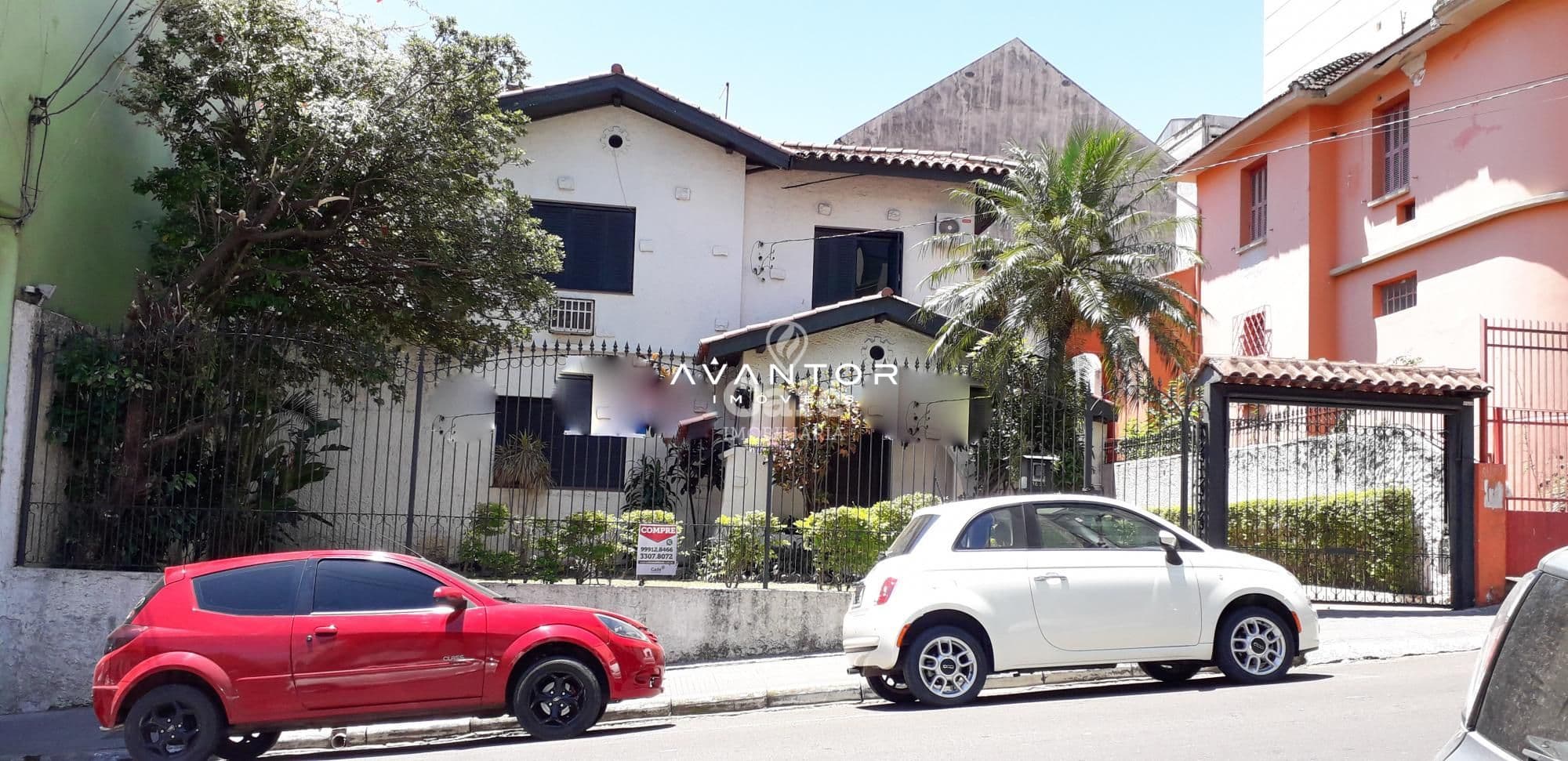 Fachada da casa com garagem — Terreno com 4 quartos à venda em Centro, Santa Maria/RS