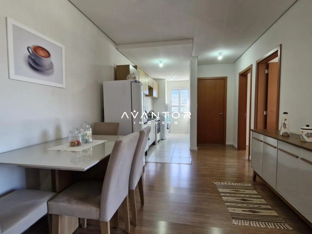 Sala de estar integrada à cozinha — Apartamento com 2 quartos à venda em Nossa Senhora das Dores, Santa Maria/RS